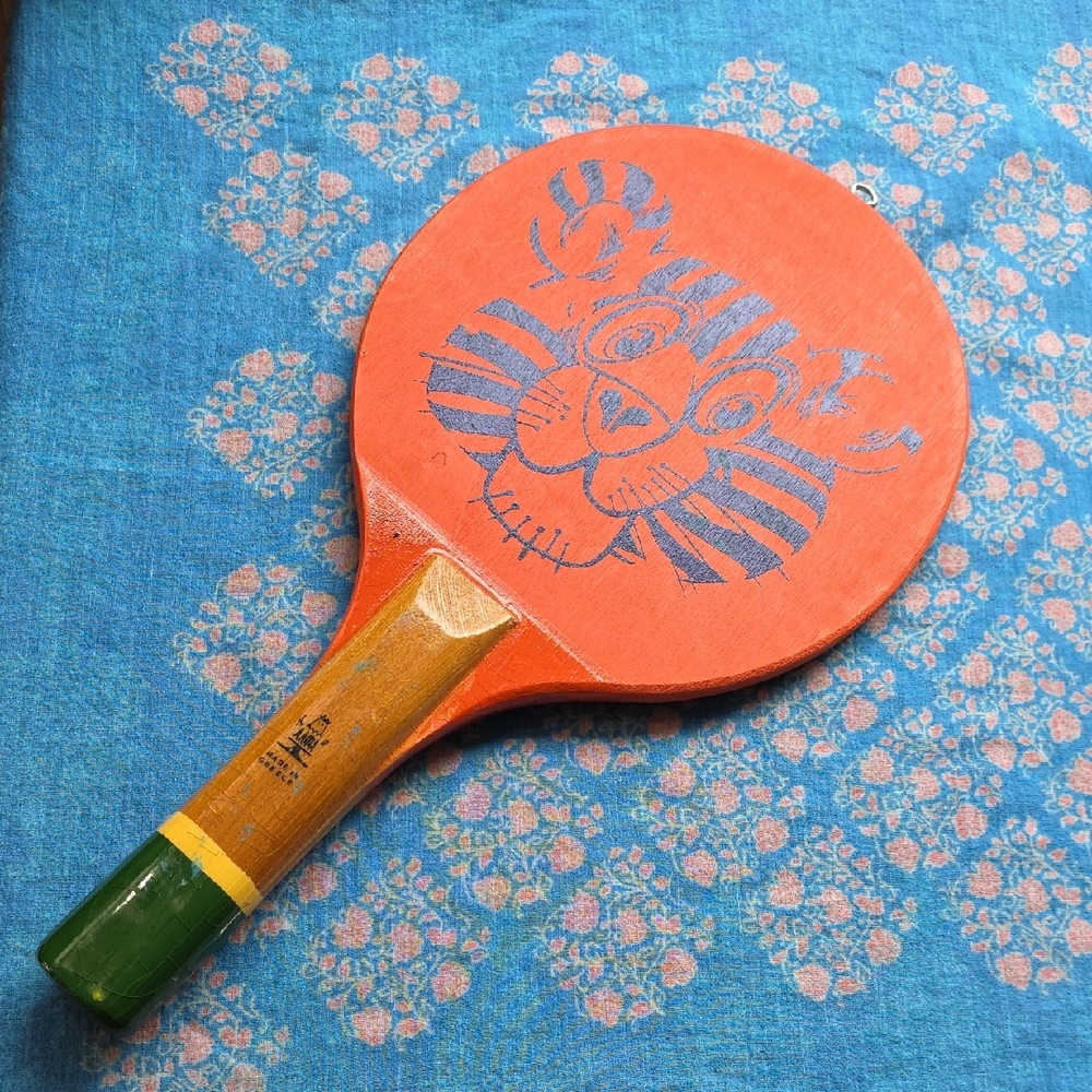 Greek Alpha Vintage Wooden Racket With Black Tiger Image On Orange Background